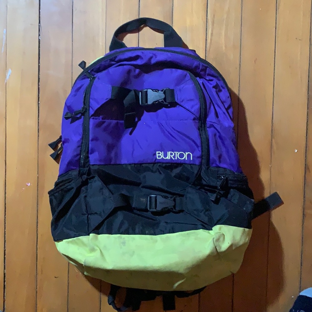 Purple, black, and yellow / green Burton backpack